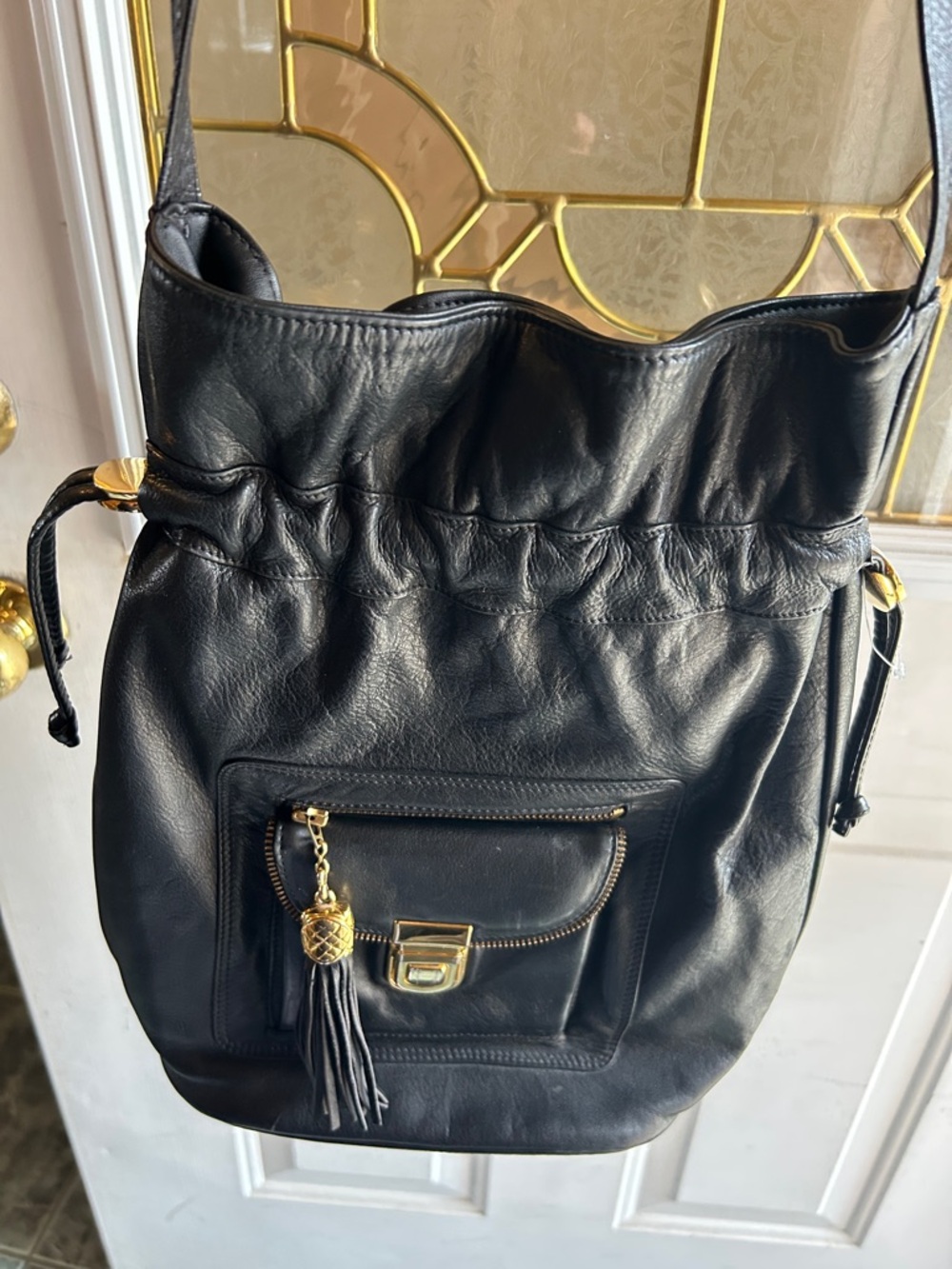Black Leather Drawstring Shoulder Bag with Gold Hardware